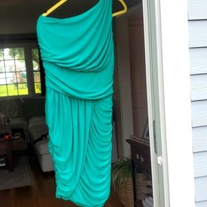 Green one shoulder ruched mini dress